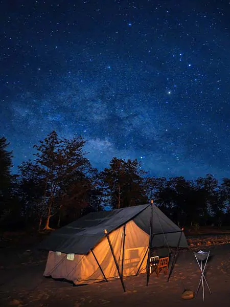 Mobile camping tent setup under a starry sky during the Forsyth Trail experience